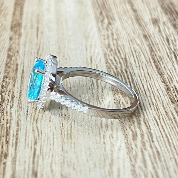 Oval Simulated Light Blue Topaz Halo Ring - 925 Sterling Silver - Picture 2 of 5